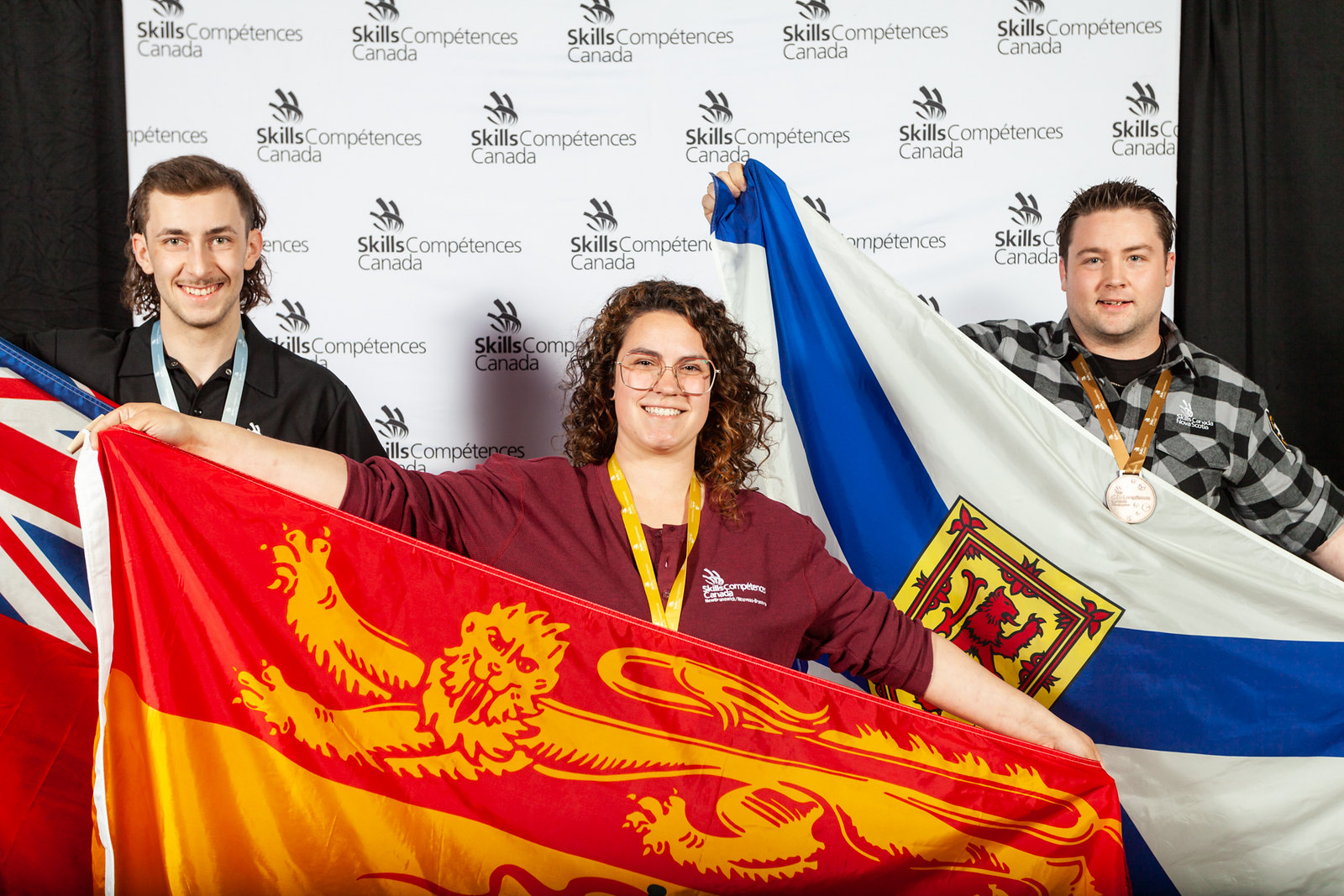 ñ̳ apprentice Alice Michaud, centre, won gold in the Car Painting competition at Skills Canada nationals. Michaud also won Best in Region for New Brunswick. 